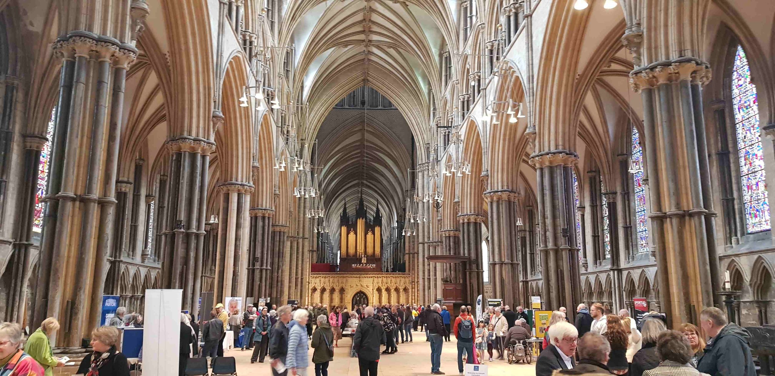Lincoln Cathedral Nave filled with people and stands at the Festival of Chaplaincy